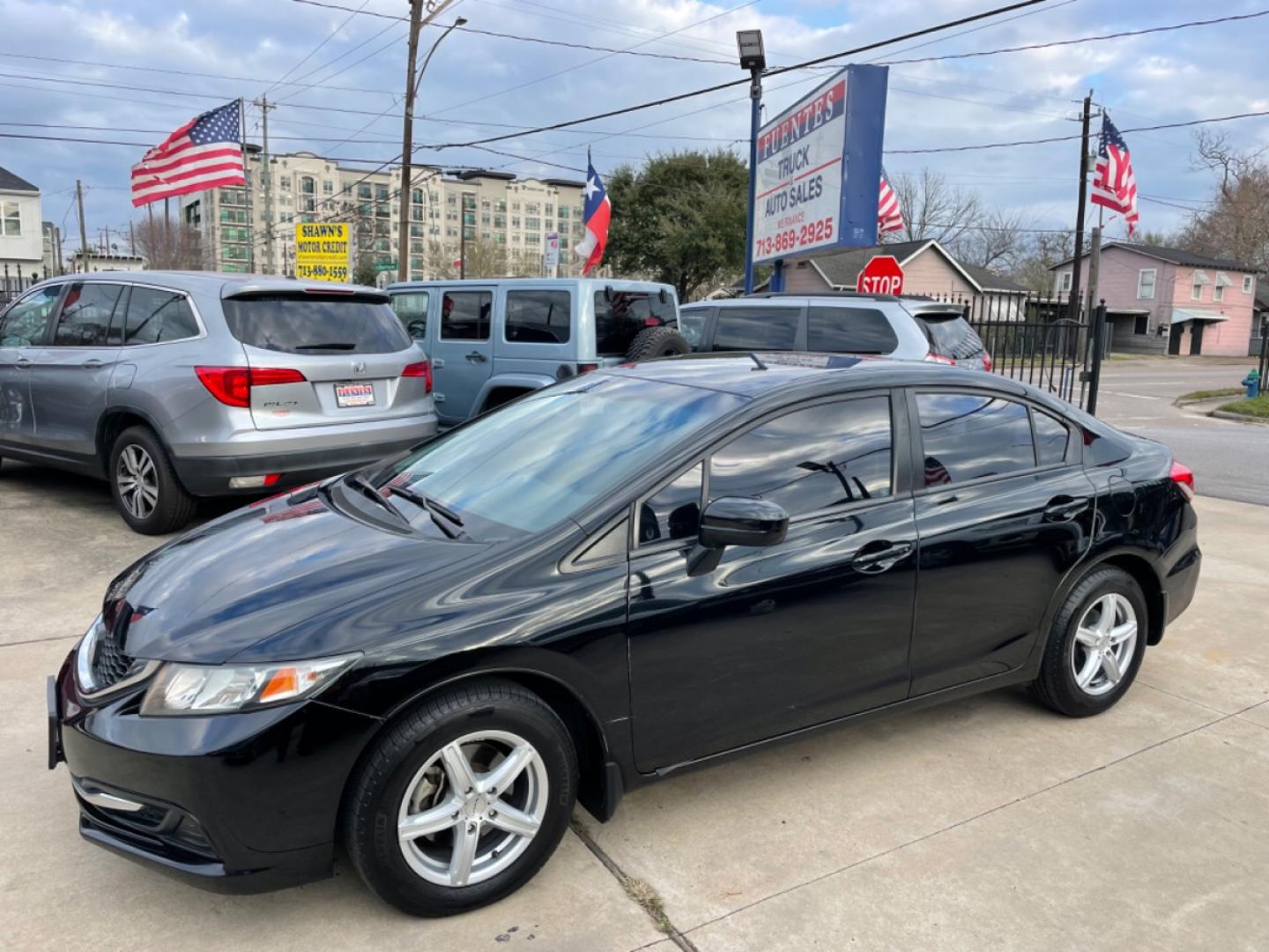 2015 Black /Black Honda Civic LX Sedan CVT (19XFB2F56FE) with an 1.8L L4 SOHC 16V engine, Continuously Variable Transmission transmission, located at 1501 West 15th St., Houston, 77008, (713) 869-2925, 29.797941, -95.411789 - Photo#0