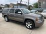 2014 Brown /Beige Chevrolet Suburban LTZ (1GNSCKE04ER) with an 5.3L V8 OHV 16V FFV engine, 6-Speed Automatic transmission, located at 1501 West 15th St., Houston, 77008, (713) 869-2925, 29.797941, -95.411789 - Photo#1