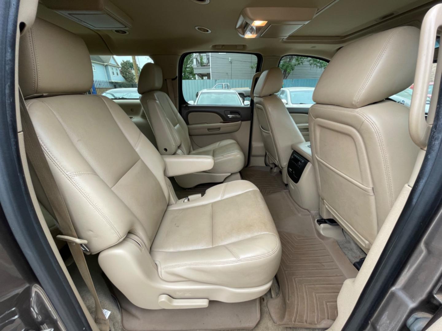 2014 Brown /Beige Chevrolet Suburban LTZ (1GNSCKE04ER) with an 5.3L V8 OHV 16V FFV engine, 6-Speed Automatic transmission, located at 1501 West 15th St., Houston, 77008, (713) 869-2925, 29.797941, -95.411789 - Photo#11