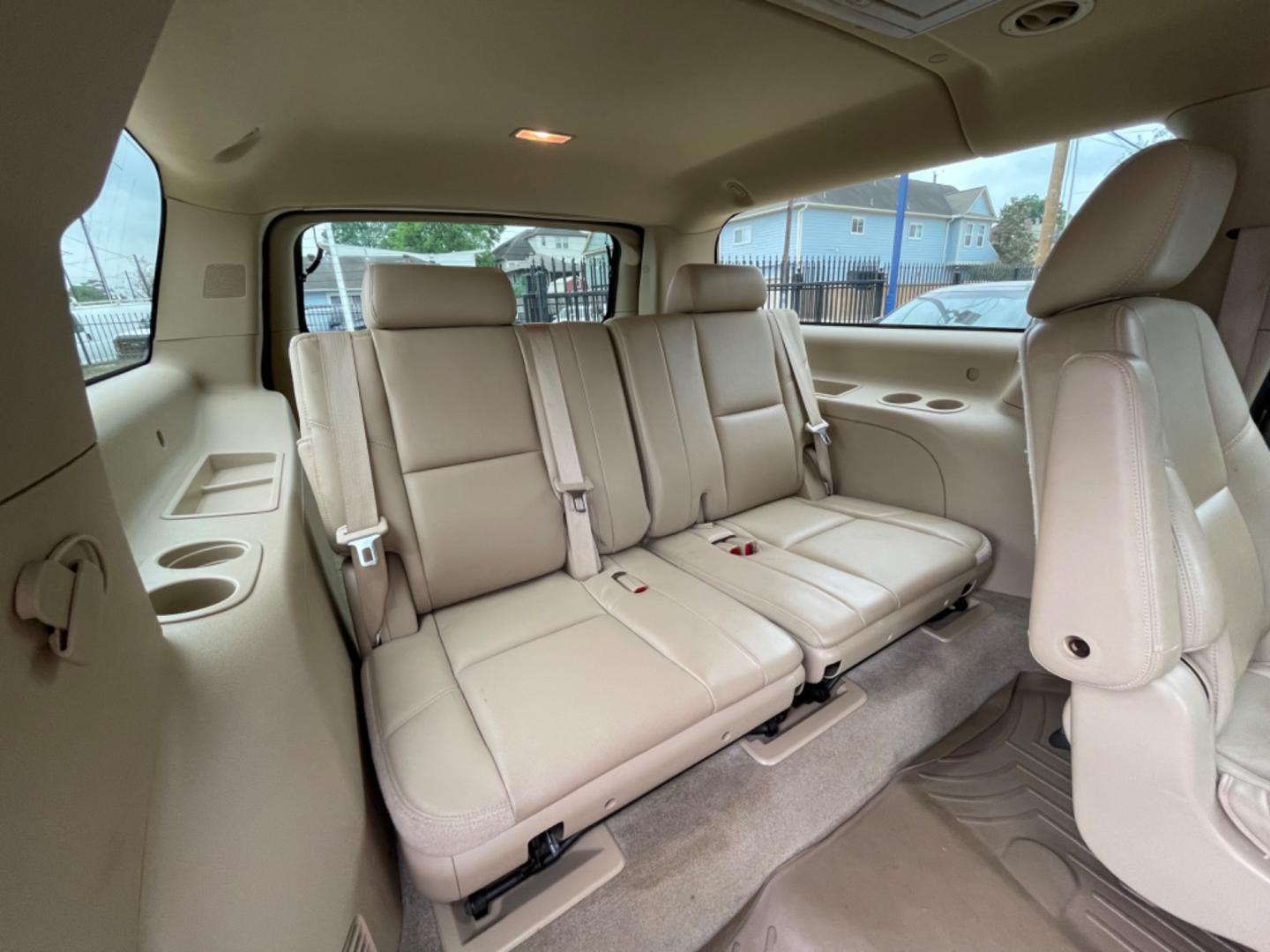 2014 Brown /Beige Chevrolet Suburban LTZ (1GNSCKE04ER) with an 5.3L V8 OHV 16V FFV engine, 6-Speed Automatic transmission, located at 1501 West 15th St., Houston, 77008, (713) 869-2925, 29.797941, -95.411789 - Photo#12