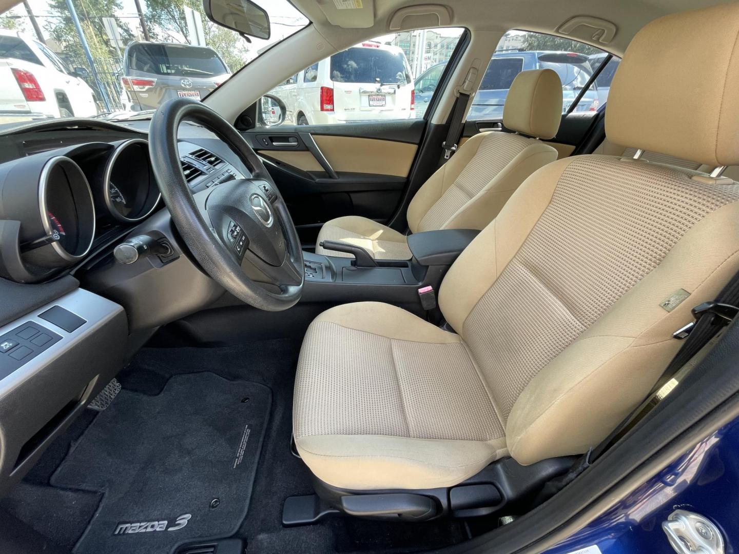 2012 Blue /Beige Mazda MAZDA3 i Touring 4-Door (JM1BL1VF1C1) with an 2.0L L4 DOHC 16V engine, Auto transmission, located at 1501 West 15th St., Houston, 77008, (713) 869-2925, 29.797941, -95.411789 - Photo#6