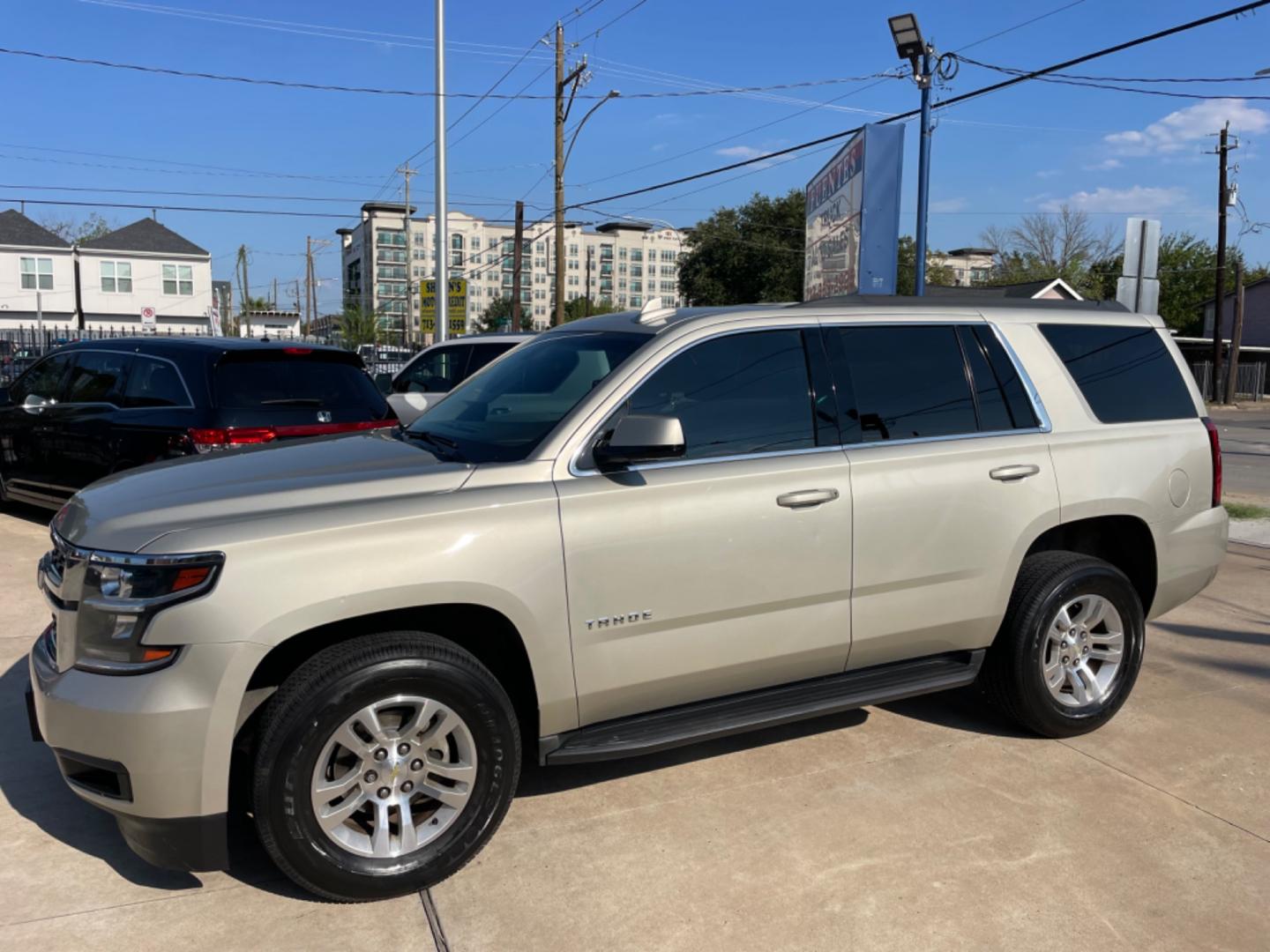 2016 Beige /Beige Chevrolet Tahoe LS 2WD (1GNSCAKCXGR) with an 5.3L V8 OHV 16V engine, 6A transmission, located at 1501 West 15th St., Houston, 77008, (713) 869-2925, 29.797941, -95.411789 - Photo#0