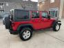 2014 Red /Black Jeep Wrangler Unlimited Sport 4WD (1C4HJWDG7EL) with an 3.6L V6 DOHC 24V FFV engine, Automatic transmission, located at 1501 West 15th St., Houston, 77008, (713) 869-2925, 29.797941, -95.411789 - Photo#0