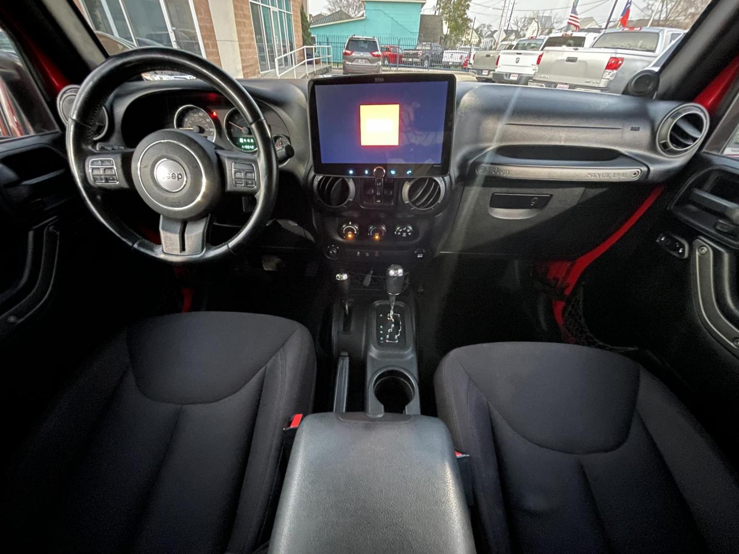 2014 Red /Black Jeep Wrangler Unlimited Sport 4WD (1C4HJWDG7EL) with an 3.6L V6 DOHC 24V FFV engine, Automatic transmission, located at 1501 West 15th St., Houston, 77008, (713) 869-2925, 29.797941, -95.411789 - Photo#10