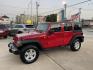 2014 Red /Black Jeep Wrangler Unlimited Sport 4WD (1C4HJWDG7EL) with an 3.6L V6 DOHC 24V FFV engine, Automatic transmission, located at 1501 West 15th St., Houston, 77008, (713) 869-2925, 29.797941, -95.411789 - Photo#2