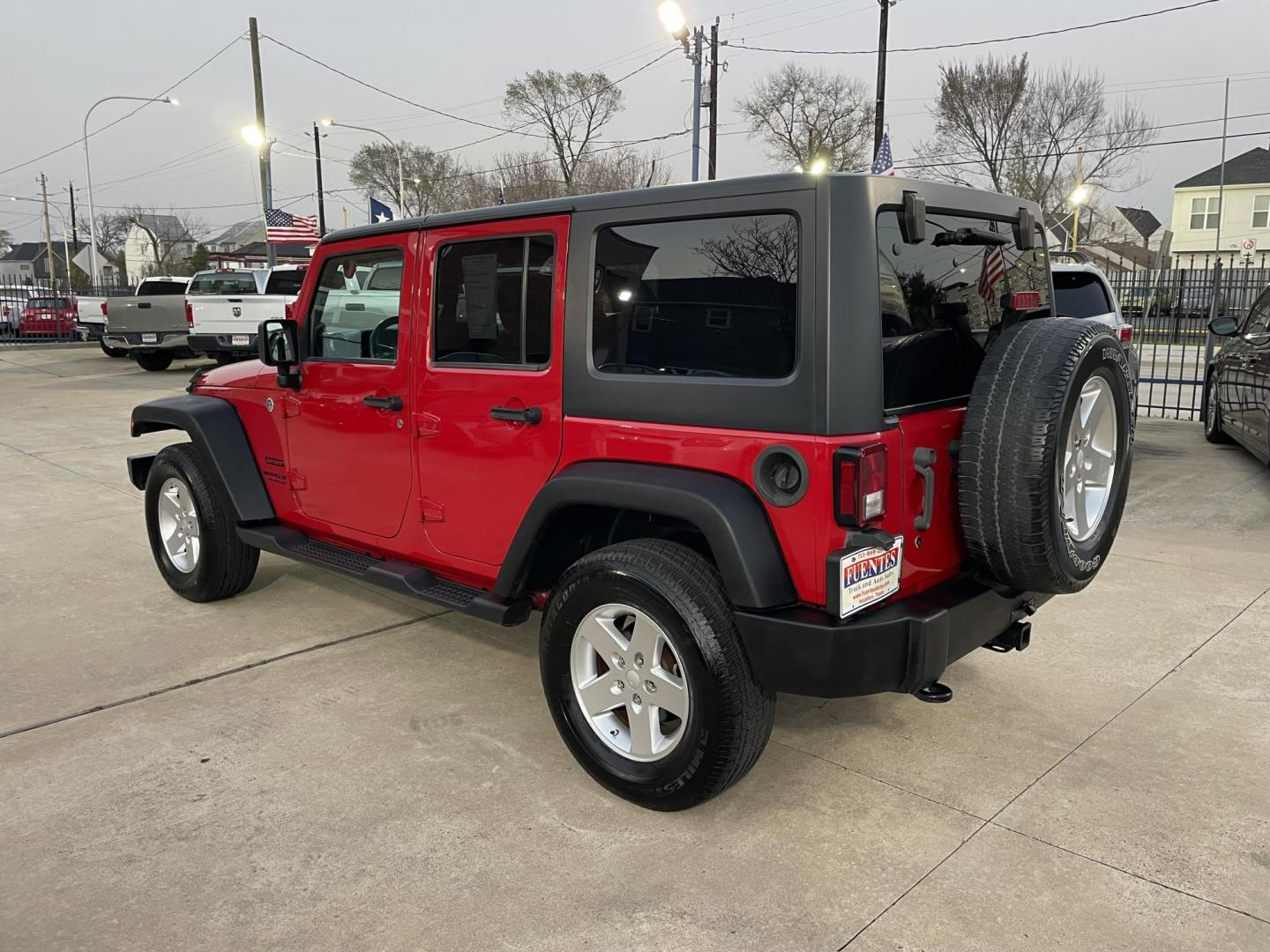 2014 Red /Black Jeep Wrangler Unlimited Sport 4WD (1C4HJWDG7EL) with an 3.6L V6 DOHC 24V FFV engine, Automatic transmission, located at 1501 West 15th St., Houston, 77008, (713) 869-2925, 29.797941, -95.411789 - Photo#5