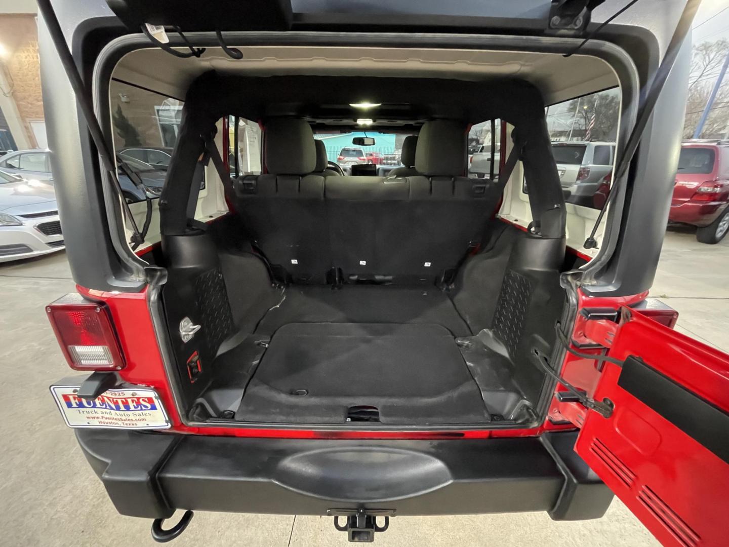 2014 Red /Black Jeep Wrangler Unlimited Sport 4WD (1C4HJWDG7EL) with an 3.6L V6 DOHC 24V FFV engine, Automatic transmission, located at 1501 West 15th St., Houston, 77008, (713) 869-2925, 29.797941, -95.411789 - Photo#7