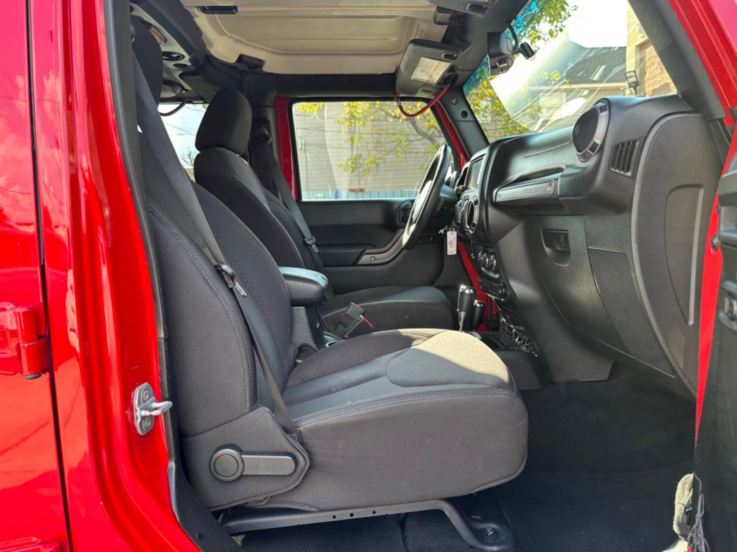 2014 Red /Black Jeep Wrangler Unlimited Sport 4WD (1C4HJWDG7EL) with an 3.6L V6 DOHC 24V FFV engine, Automatic transmission, located at 1501 West 15th St., Houston, 77008, (713) 869-2925, 29.797941, -95.411789 - Photo#4