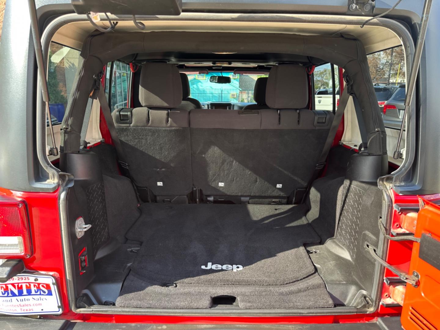 2014 Red /Black Jeep Wrangler Unlimited Sport 4WD (1C4HJWDG7EL) with an 3.6L V6 DOHC 24V FFV engine, Automatic transmission, located at 1501 West 15th St., Houston, 77008, (713) 869-2925, 29.797941, -95.411789 - Photo#6