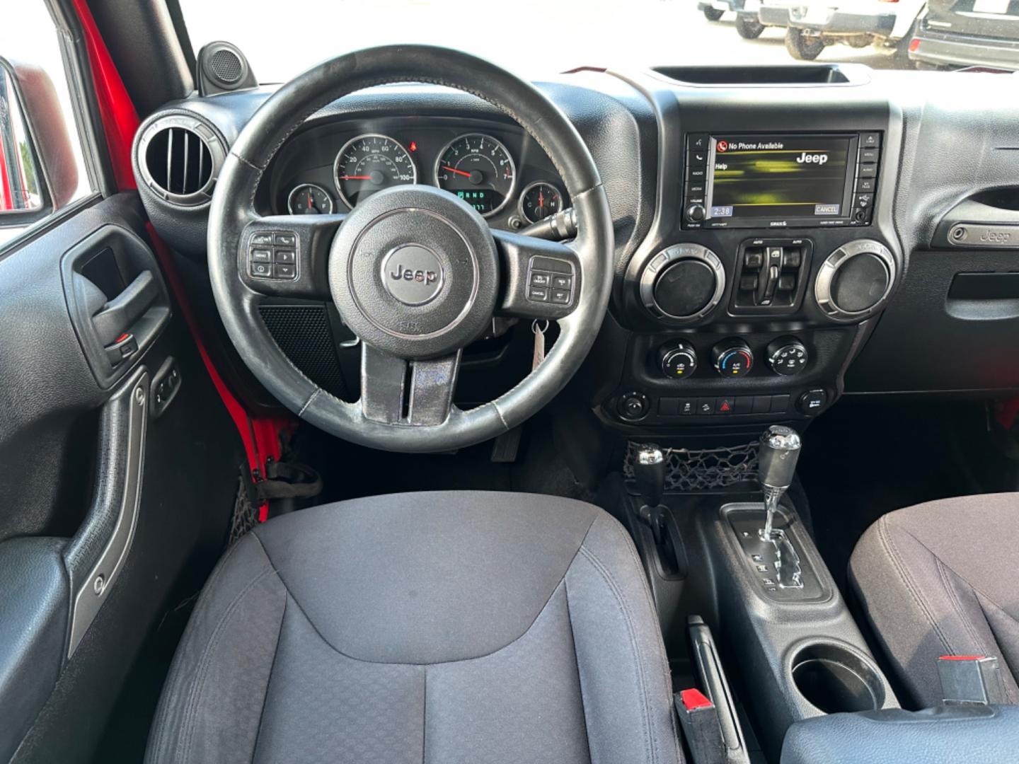 2014 Red /Black Jeep Wrangler Unlimited Sport 4WD (1C4HJWDG7EL) with an 3.6L V6 DOHC 24V FFV engine, Automatic transmission, located at 1501 West 15th St., Houston, 77008, (713) 869-2925, 29.797941, -95.411789 - Photo#8