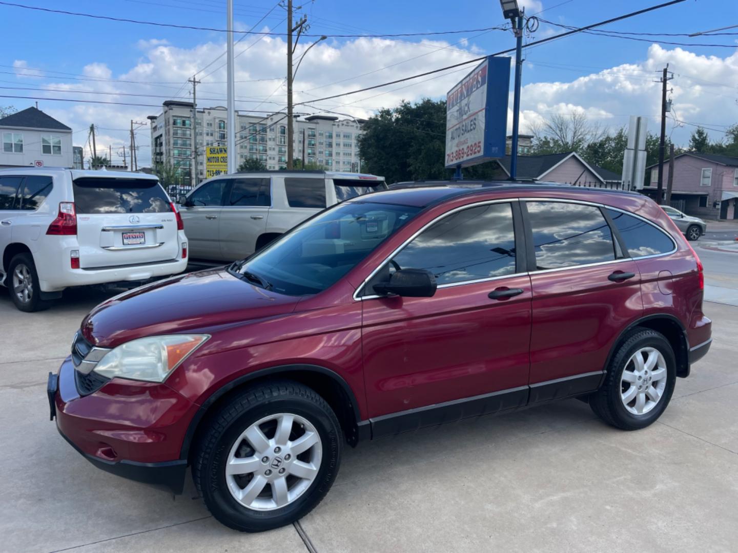 2011 Red /Silver Honda CR-V SE 2WD 5-Speed AT (5J6RE3H43BL) with an 2.4L L4 DOHC 16V engine, 5-Speed Automatic transmission, located at 1501 West 15th St., Houston, 77008, (713) 869-2925, 29.797941, -95.411789 - Photo#0