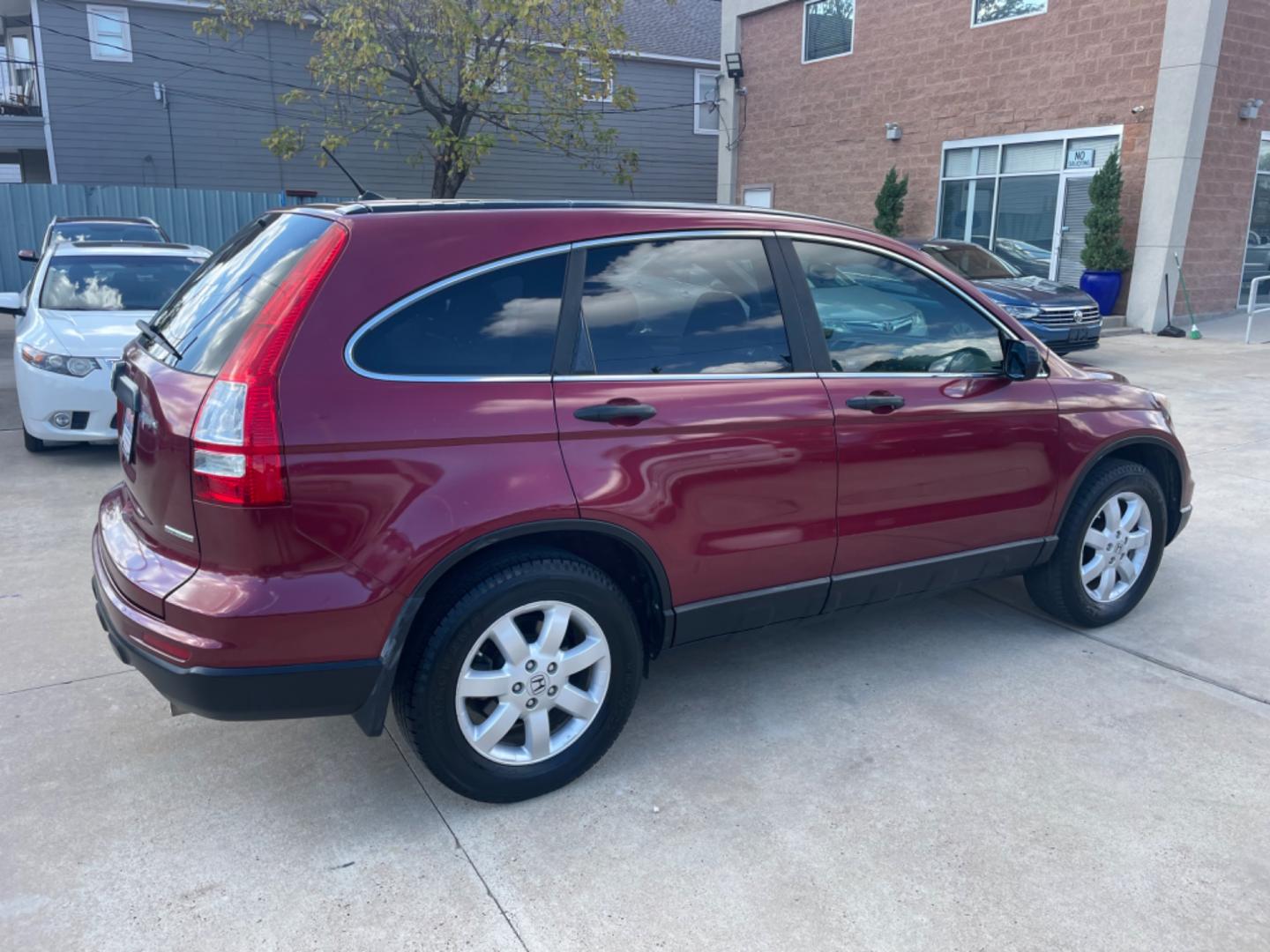 2011 Red /Silver Honda CR-V SE 2WD 5-Speed AT (5J6RE3H43BL) with an 2.4L L4 DOHC 16V engine, 5-Speed Automatic transmission, located at 1501 West 15th St., Houston, 77008, (713) 869-2925, 29.797941, -95.411789 - Photo#2