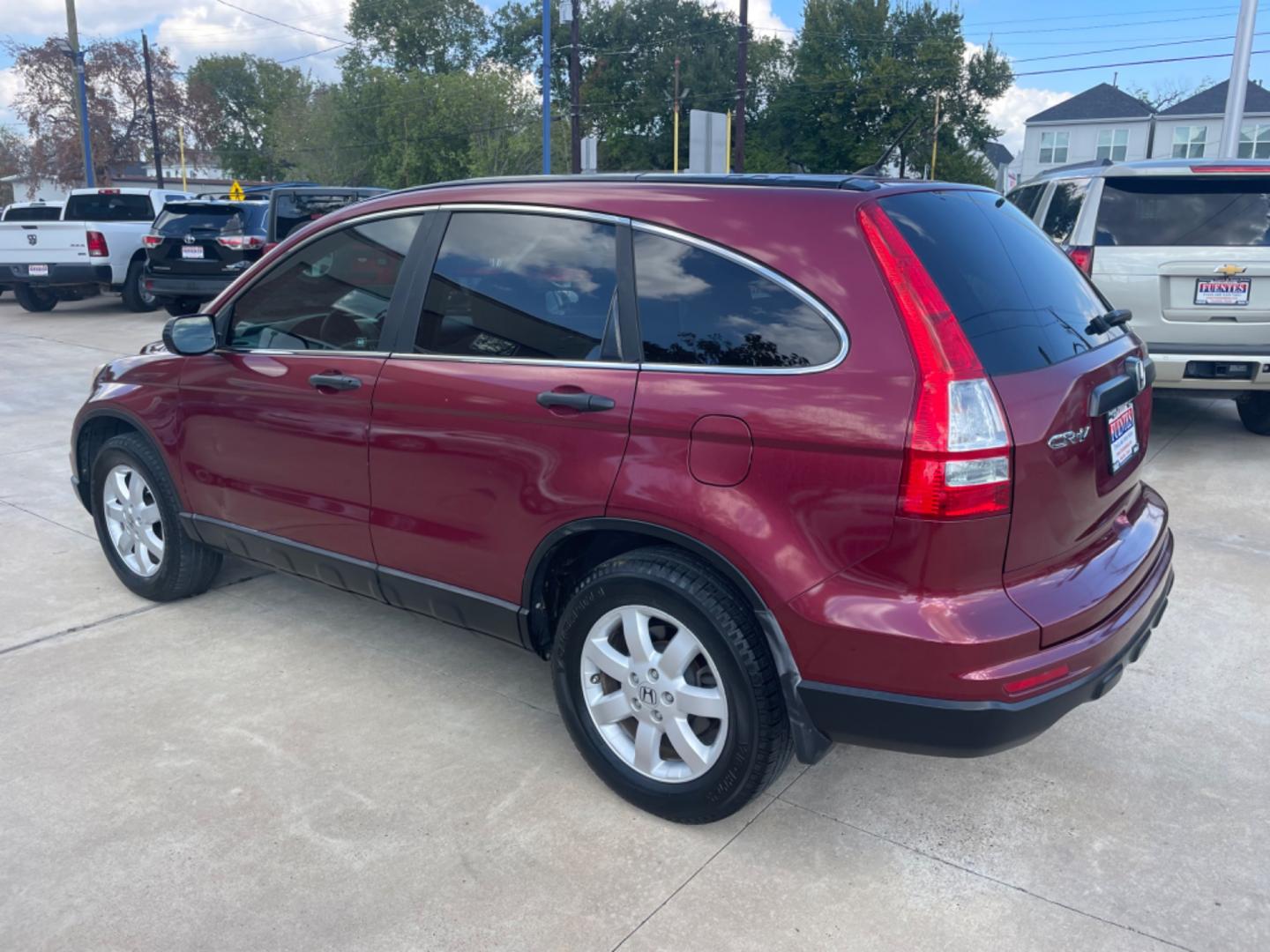 2011 Red /Silver Honda CR-V SE 2WD 5-Speed AT (5J6RE3H43BL) with an 2.4L L4 DOHC 16V engine, 5-Speed Automatic transmission, located at 1501 West 15th St., Houston, 77008, (713) 869-2925, 29.797941, -95.411789 - Photo#3