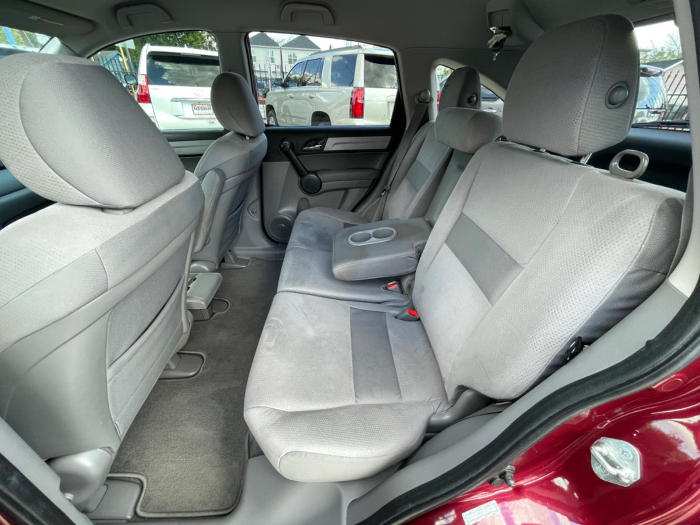 2011 Red /Silver Honda CR-V SE 2WD 5-Speed AT (5J6RE3H43BL) with an 2.4L L4 DOHC 16V engine, 5-Speed Automatic transmission, located at 1501 West 15th St., Houston, 77008, (713) 869-2925, 29.797941, -95.411789 - Photo#5