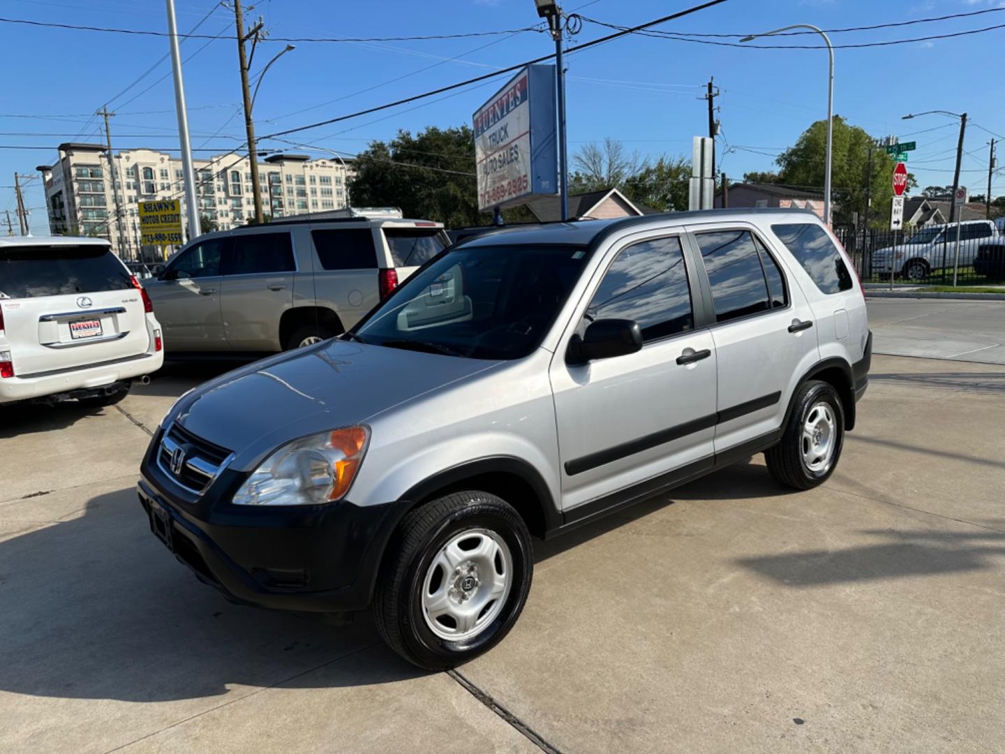 2002 Silver /Black Honda CR-V LX 2WD (JHLRD68532C) with an 2.4L L4 DOHC 16V engine, 4-Speed Automatic Overdrive transmission, located at 1501 West 15th St., Houston, 77008, (713) 869-2925, 29.797941, -95.411789 - Photo#0