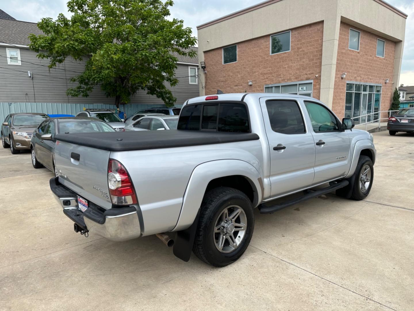 2012 Silver /Silver Toyota Tacoma Sr5 (5TFJX4GN3CX) with an 2.7L engine, Automatic transmission, located at 1501 West 15th St., Houston, 77008, (713) 869-2925, 29.797941, -95.411789 - Photo#2