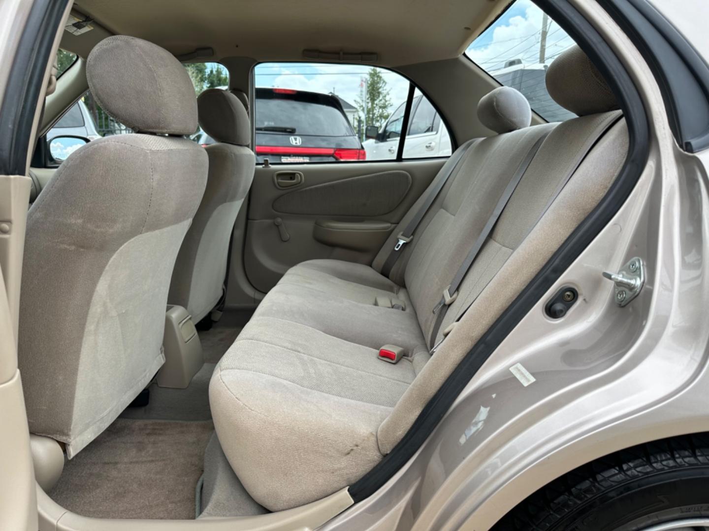 2002 Beige /Beige Toyota Corolla CE (1NXBR12E92Z) with an 1.8L L4 DOHC 16V engine, Automatic transmission, located at 1501 West 15th St., Houston, 77008, (713) 869-2925, 29.797941, -95.411789 - Photo#6