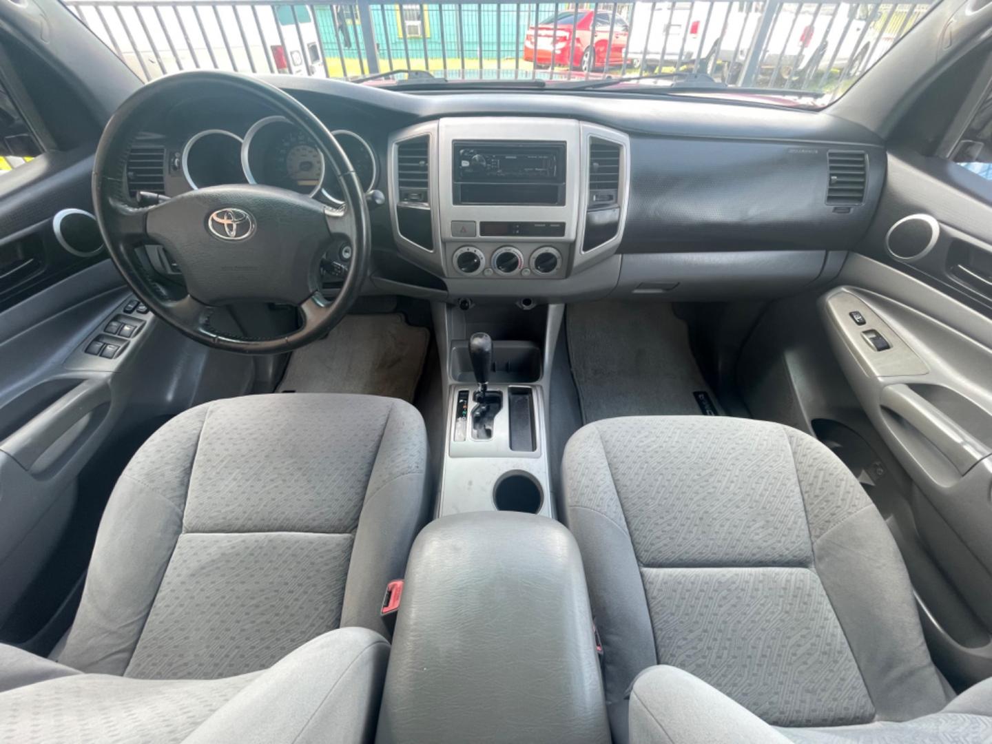 2006 Red /Silver Toyota Tacoma Sr5 (5TEJU62N26Z) with an 4.0L engine, Automatic transmission, located at 1501 West 15th St., Houston, 77008, (713) 869-2925, 29.797941, -95.411789 - Photo#8