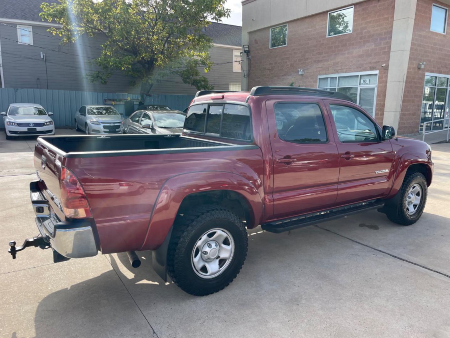 2006 Red /Silver Toyota Tacoma Sr5 (5TEJU62N26Z) with an 4.0L engine, Automatic transmission, located at 1501 West 15th St., Houston, 77008, (713) 869-2925, 29.797941, -95.411789 - Photo#2