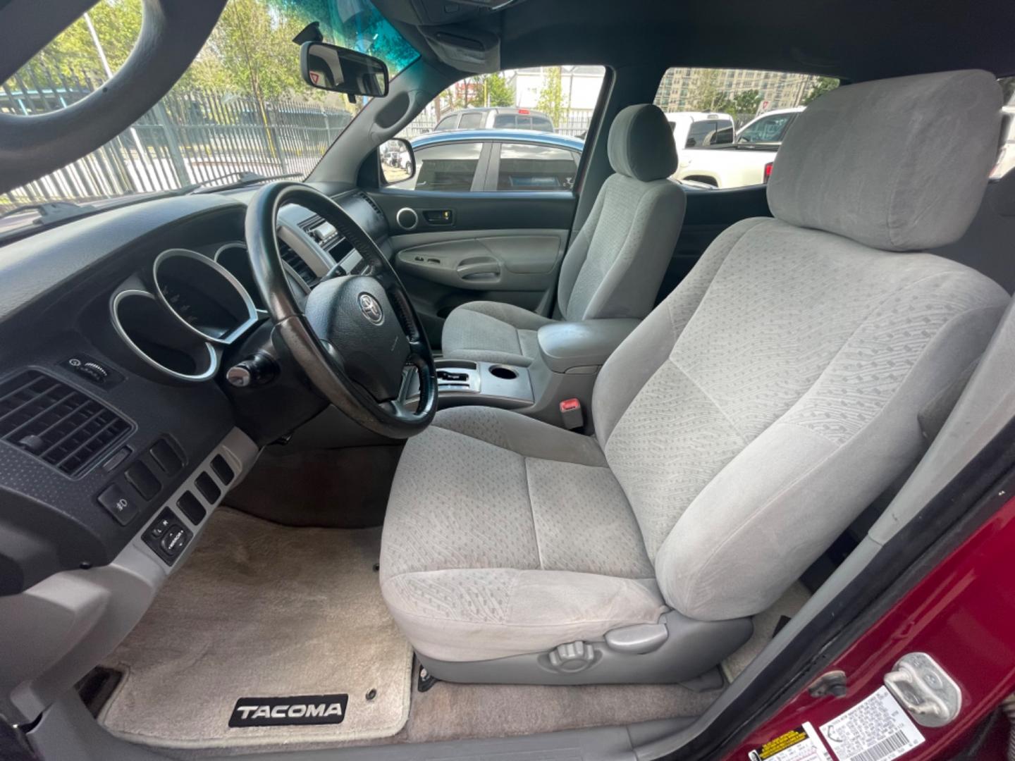 2006 Red /Silver Toyota Tacoma Sr5 (5TEJU62N26Z) with an 4.0L engine, Automatic transmission, located at 1501 West 15th St., Houston, 77008, (713) 869-2925, 29.797941, -95.411789 - Photo#4