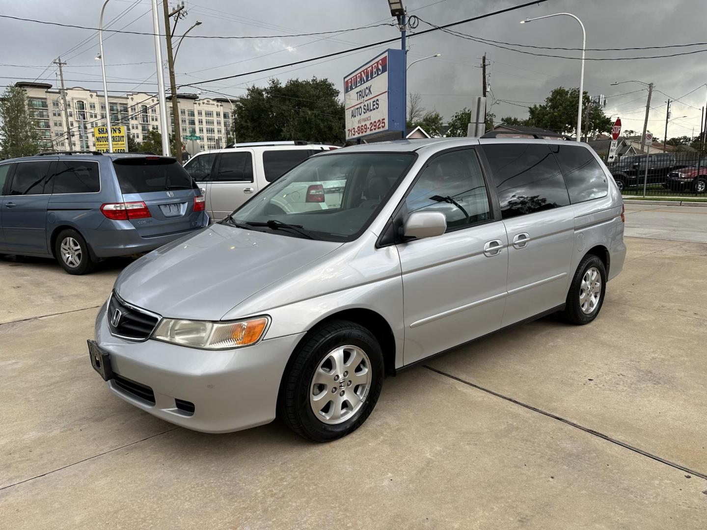 2004 /Silver Honda Odyssey EX w/ Leather (5FNRL18934B) with an 3.5L V6 SOHC 24V engine, 5-Speed Automatic Overdrive transmission, located at 1501 West 15th St., Houston, 77008, (713) 869-2925, 29.797941, -95.411789 - Photo#0