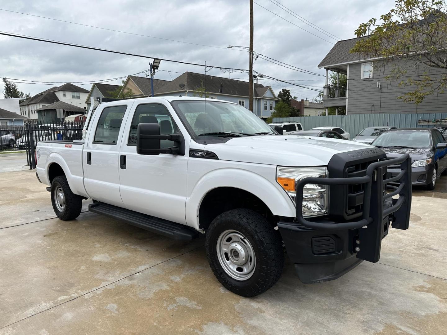 2013 Ford F-250 SD King Ranch Crew Cab 4WD (1FT7W2B65DE) with an 6.2L V8 OHV 16V engine, 6-Speed Automatic transmission, located at 1501 West 15th St., Houston, 77008, (713) 869-2925, 29.797941, -95.411789 - Photo#1