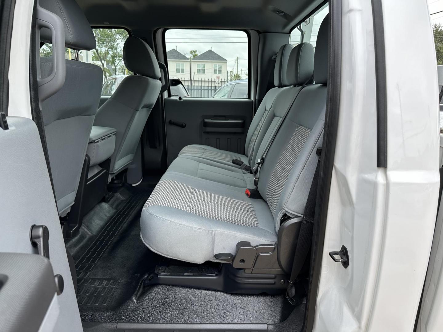 2013 Ford F-250 SD King Ranch Crew Cab 4WD (1FT7W2B65DE) with an 6.2L V8 OHV 16V engine, 6-Speed Automatic transmission, located at 1501 West 15th St., Houston, 77008, (713) 869-2925, 29.797941, -95.411789 - Photo#7