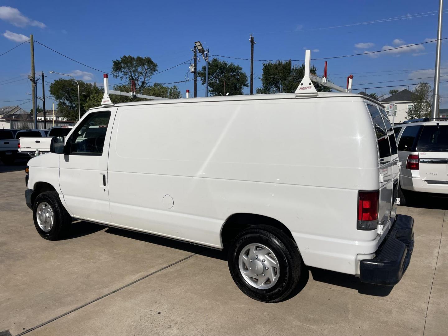 2012 Ford E-Series Van E-150 (1FTNE1EW9CD) with an 4.6L V8 SOHC 16V engine, 4-Speed Automatic transmission, located at 1501 West 15th St., Houston, 77008, (713) 869-2925, 29.797941, -95.411789 - Photo#3