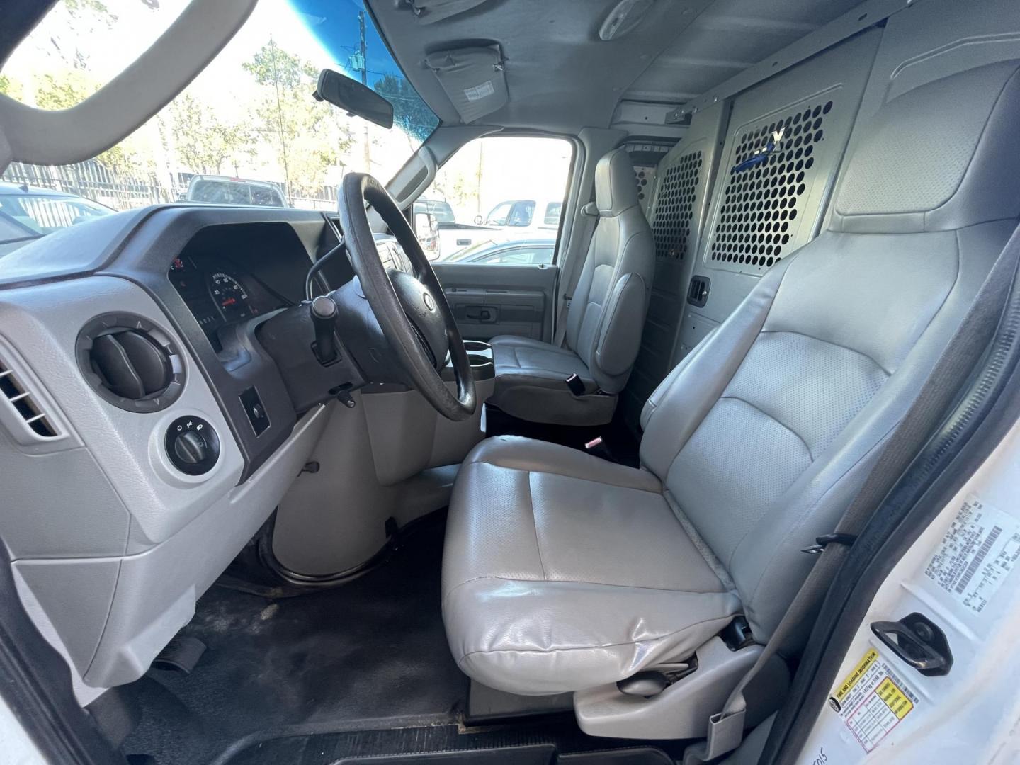 2012 Ford E-Series Van E-150 (1FTNE1EW9CD) with an 4.6L V8 SOHC 16V engine, 4-Speed Automatic transmission, located at 1501 West 15th St., Houston, 77008, (713) 869-2925, 29.797941, -95.411789 - Photo#4