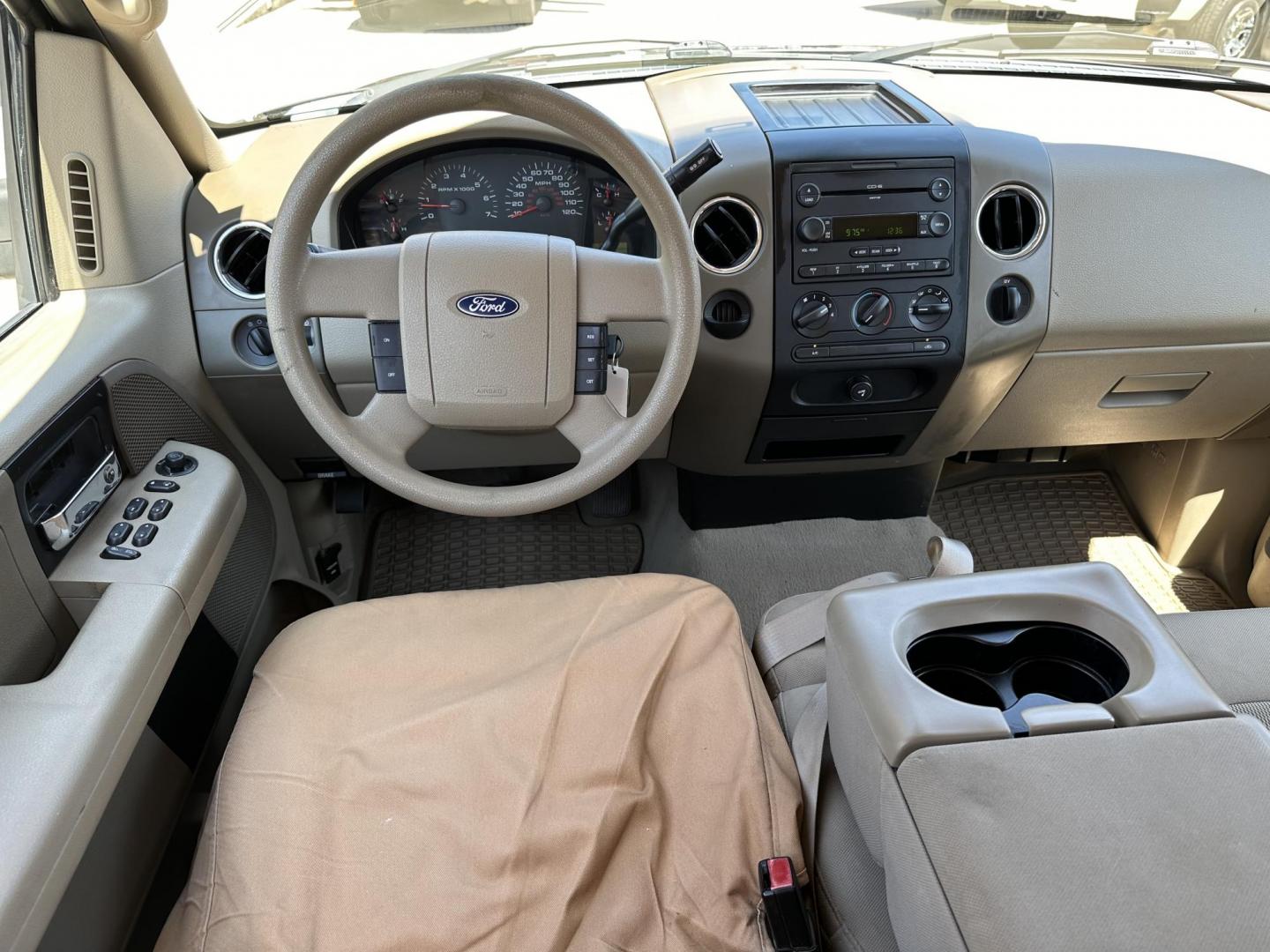 2005 /Tan Ford F-150 Lariat SuperCab 2WD (1FTRX12W05N) with an 4.6L V8 SOHC 16V engine, 4-Speed Automatic Overdrive transmission, located at 1501 West 15th St., Houston, 77008, (713) 869-2925, 29.797941, -95.411789 - Photo#7