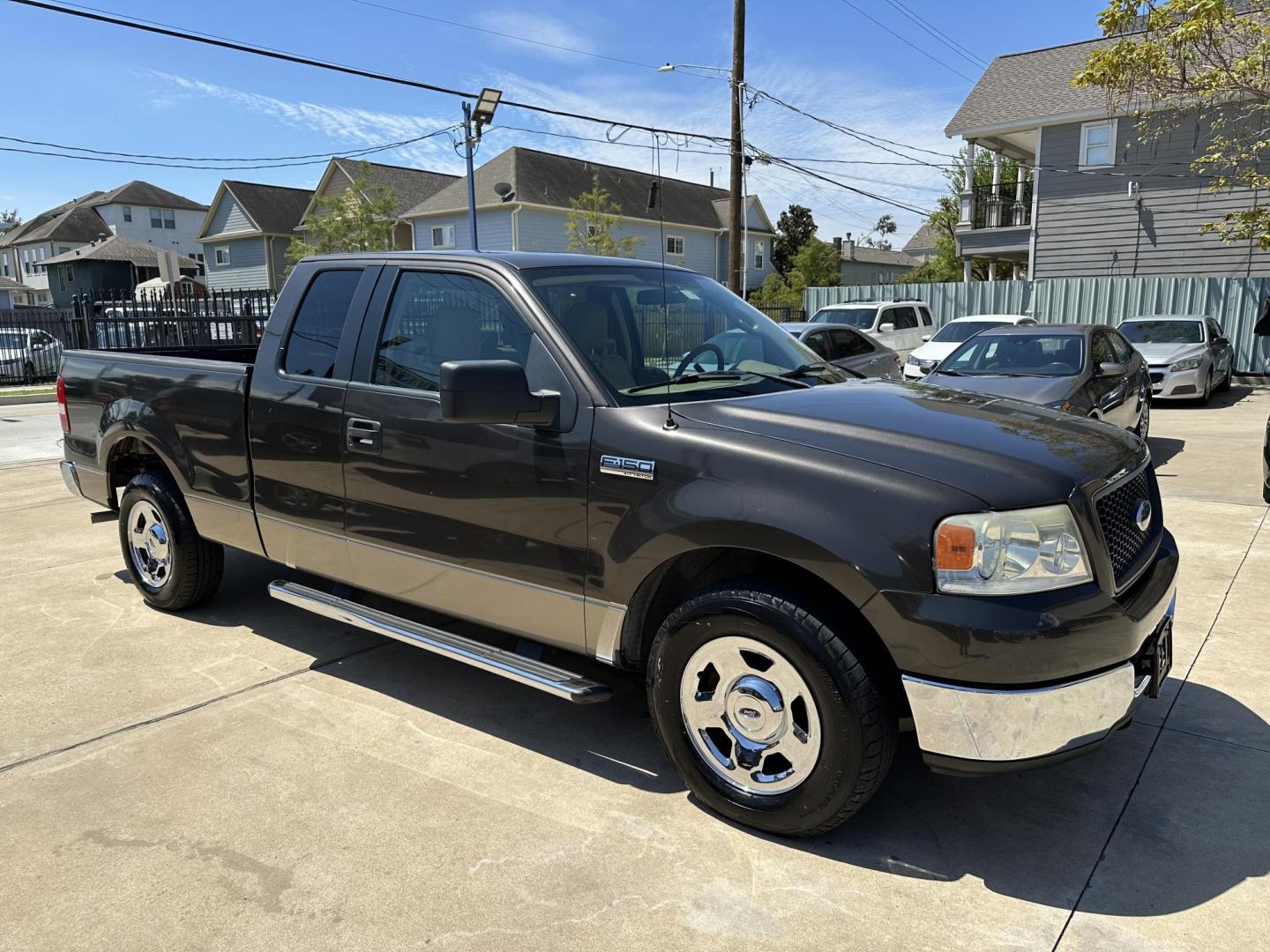 2005 /Tan Ford F-150 Lariat SuperCab 2WD (1FTRX12W05N) with an 4.6L V8 SOHC 16V engine, 4-Speed Automatic Overdrive transmission, located at 1501 West 15th St., Houston, 77008, (713) 869-2925, 29.797941, -95.411789 - Photo#1