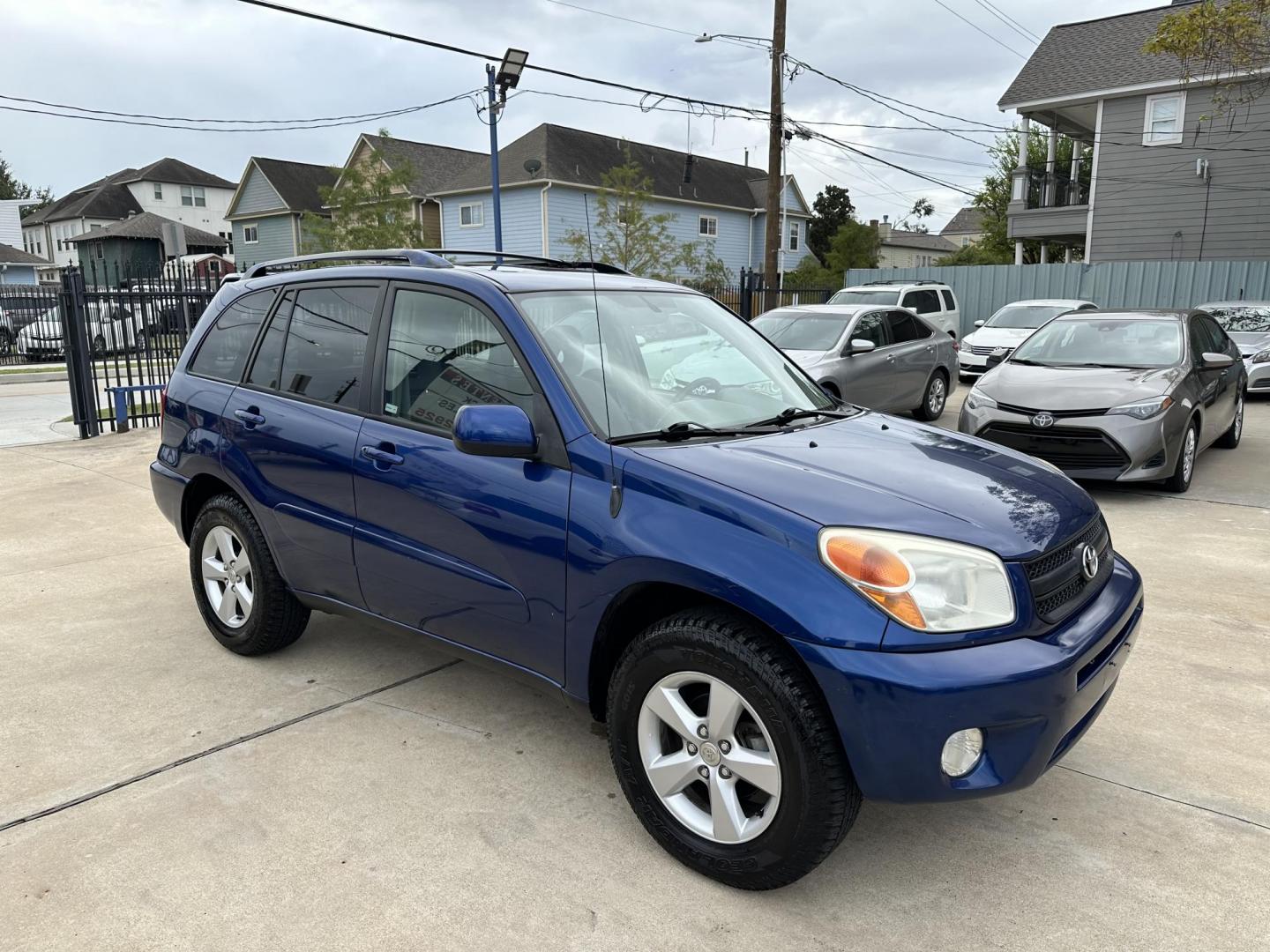 2005 Blue /Silver Toyota RAV4 2WD (JTEGD20V650) with an 2.4L L4 DOHC 16V engine, Automatic transmission, located at 1501 West 15th St., Houston, 77008, (713) 869-2925, 29.797941, -95.411789 - Photo#1