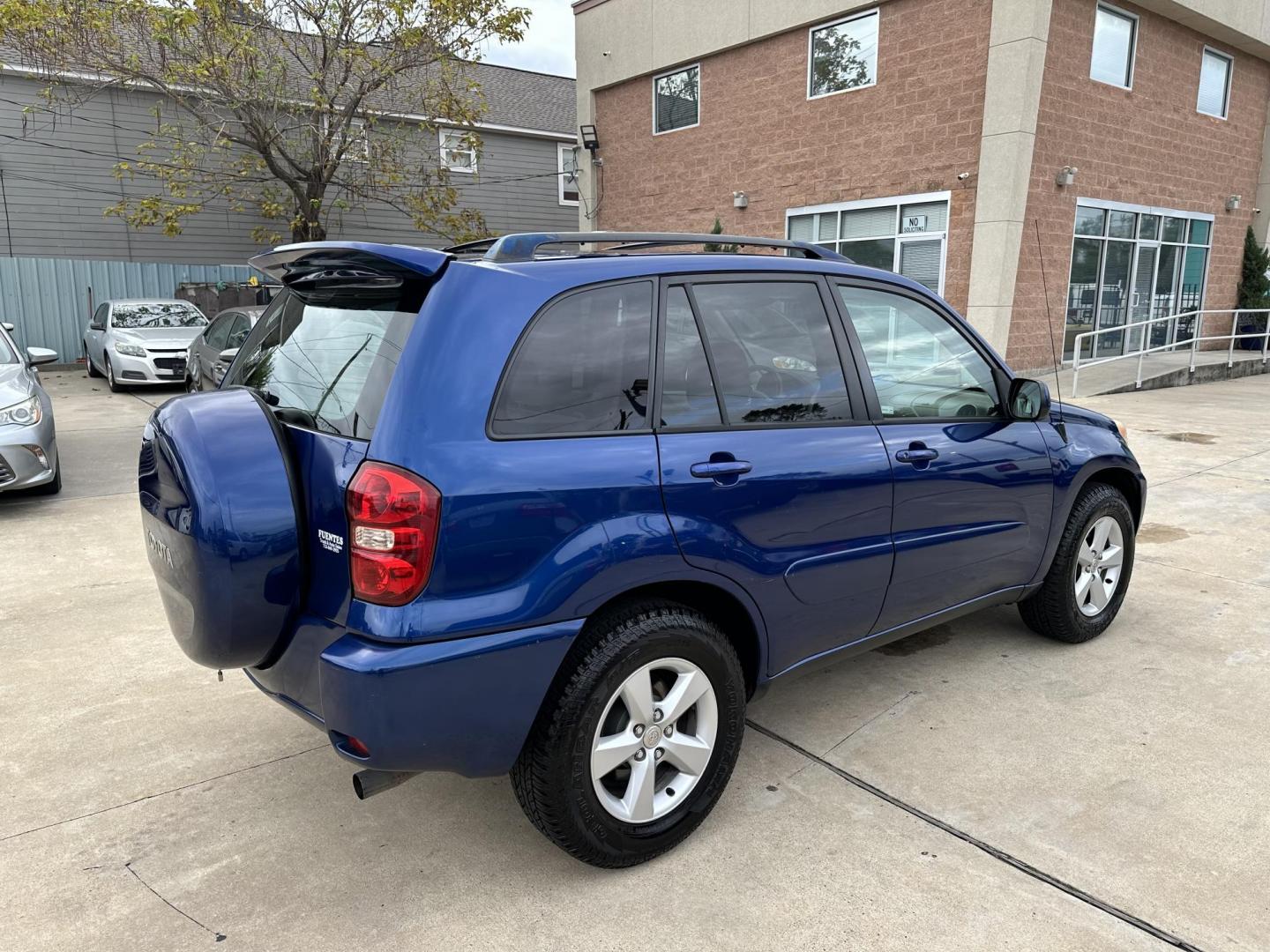 2005 Blue /Silver Toyota RAV4 2WD (JTEGD20V650) with an 2.4L L4 DOHC 16V engine, Automatic transmission, located at 1501 West 15th St., Houston, 77008, (713) 869-2925, 29.797941, -95.411789 - Photo#2