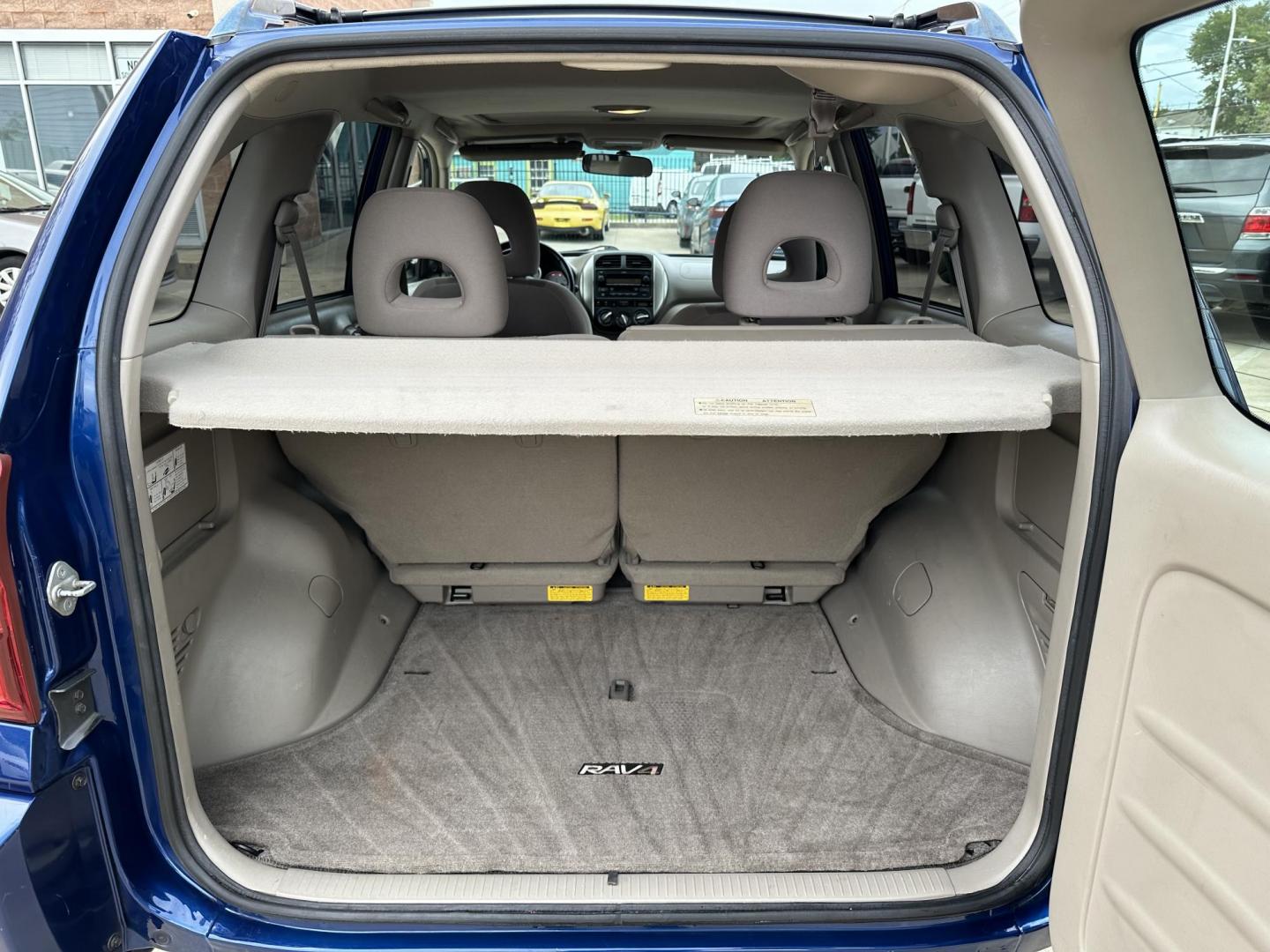 2005 Blue /Silver Toyota RAV4 2WD (JTEGD20V650) with an 2.4L L4 DOHC 16V engine, Automatic transmission, located at 1501 West 15th St., Houston, 77008, (713) 869-2925, 29.797941, -95.411789 - Photo#4