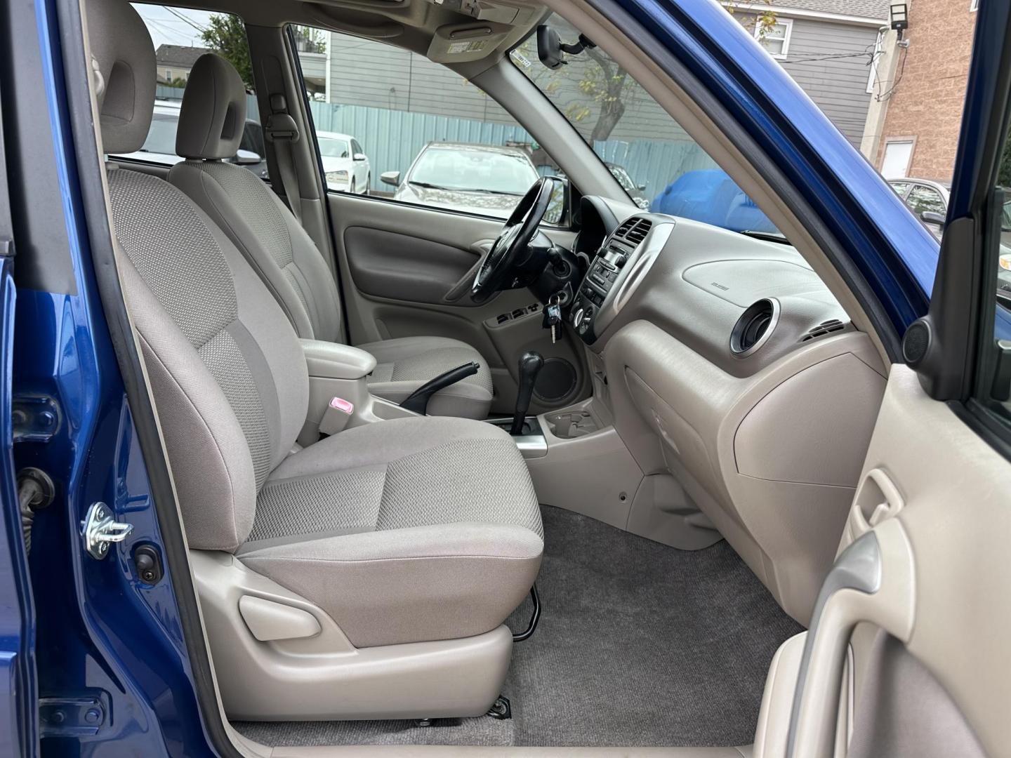 2005 Blue /Silver Toyota RAV4 2WD (JTEGD20V650) with an 2.4L L4 DOHC 16V engine, Automatic transmission, located at 1501 West 15th St., Houston, 77008, (713) 869-2925, 29.797941, -95.411789 - Photo#5