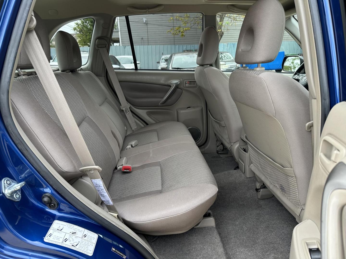 2005 Blue /Silver Toyota RAV4 2WD (JTEGD20V650) with an 2.4L L4 DOHC 16V engine, Automatic transmission, located at 1501 West 15th St., Houston, 77008, (713) 869-2925, 29.797941, -95.411789 - Photo#6