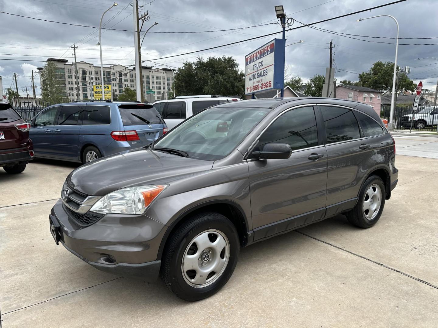 2010 Gray /Tan Honda CR-V LX 2WD 5-Speed AT (3CZRE3H39AG) with an 2.4L L4 DOHC 16V engine, 5-Speed Automatic transmission, located at 1501 West 15th St., Houston, 77008, (713) 869-2925, 29.797941, -95.411789 - Photo#0