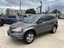 2010 Gray /Tan Honda CR-V LX 2WD 5-Speed AT (3CZRE3H39AG) with an 2.4L L4 DOHC 16V engine, 5-Speed Automatic transmission, located at 1501 West 15th St., Houston, 77008, (713) 869-2925, 29.797941, -95.411789 - Photo#0