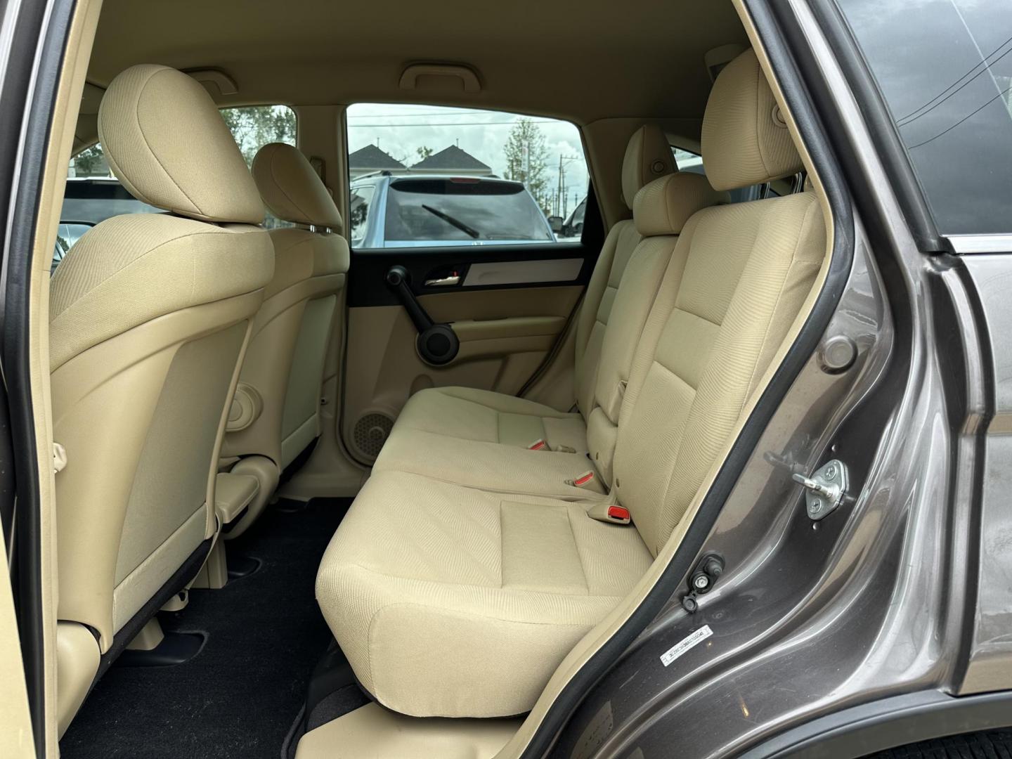 2010 Gray /Tan Honda CR-V LX 2WD 5-Speed AT (3CZRE3H39AG) with an 2.4L L4 DOHC 16V engine, 5-Speed Automatic transmission, located at 1501 West 15th St., Houston, 77008, (713) 869-2925, 29.797941, -95.411789 - Photo#7