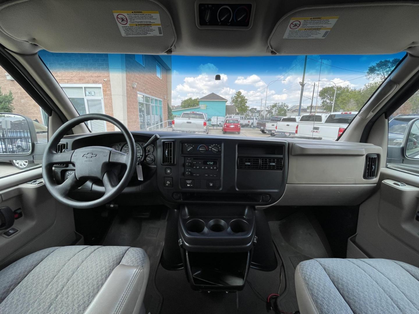 2007 White /Beige Chevrolet Express LS 3500 Extended (1GAHG39U271) with an 6.0L V8 OHV 16V engine, 4-Speed Automatic Overdrive transmission, located at 1501 West 15th St., Houston, 77008, (713) 869-2925, 29.797941, -95.411789 - Photo#14