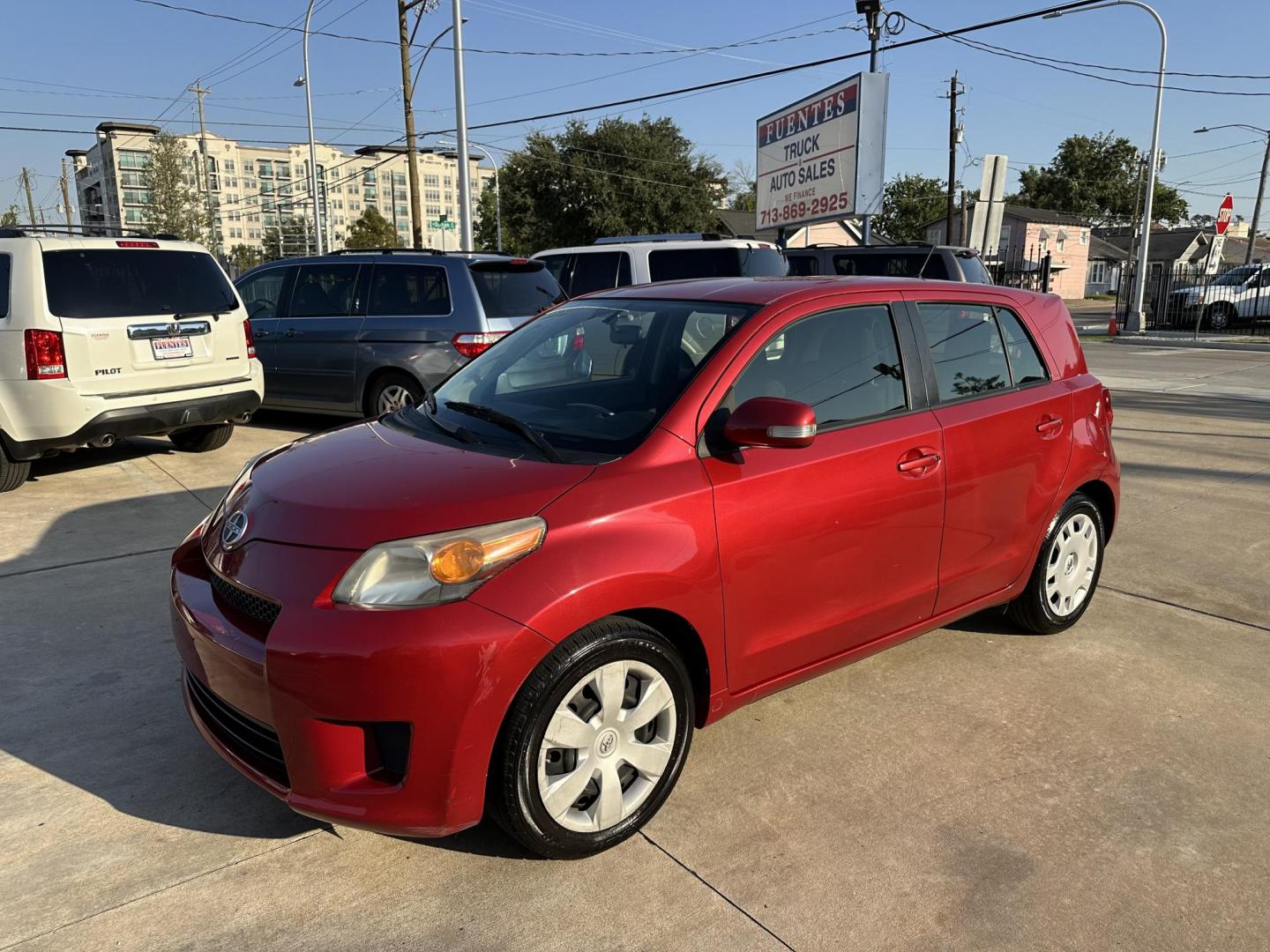 2014 Red /Black Scion xD 5-Door Hatchback 4-Spd AT (JTKKUPB47E1) with an 1.8L L4 DOHC16V engine, 4-Speed Automatic transmission, located at 1501 West 15th St., Houston, 77008, (713) 869-2925, 29.797941, -95.411789 - Photo#0