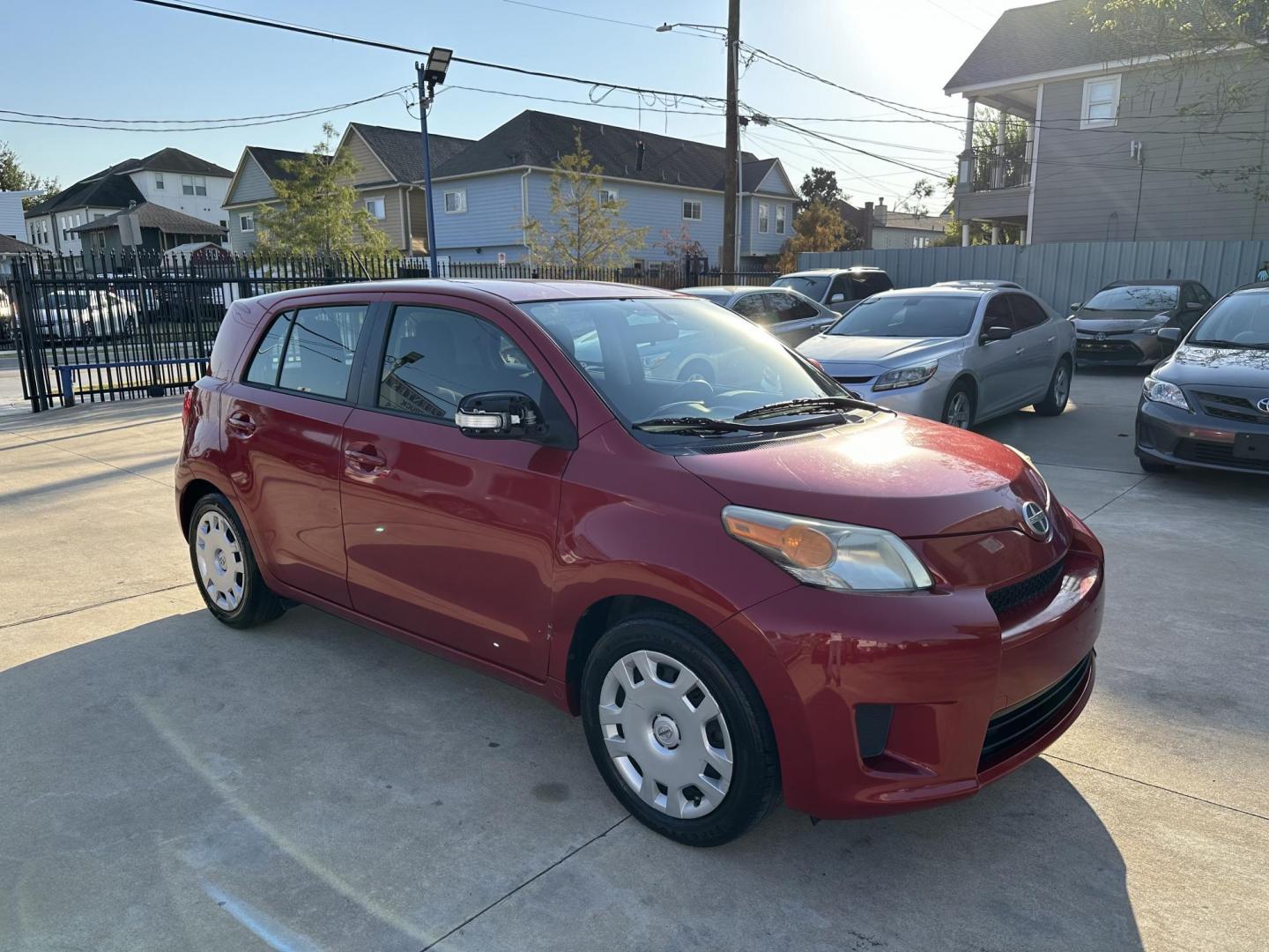 2014 Red /Black Scion xD 5-Door Hatchback 4-Spd AT (JTKKUPB47E1) with an 1.8L L4 DOHC16V engine, 4-Speed Automatic transmission, located at 1501 West 15th St., Houston, 77008, (713) 869-2925, 29.797941, -95.411789 - Photo#1