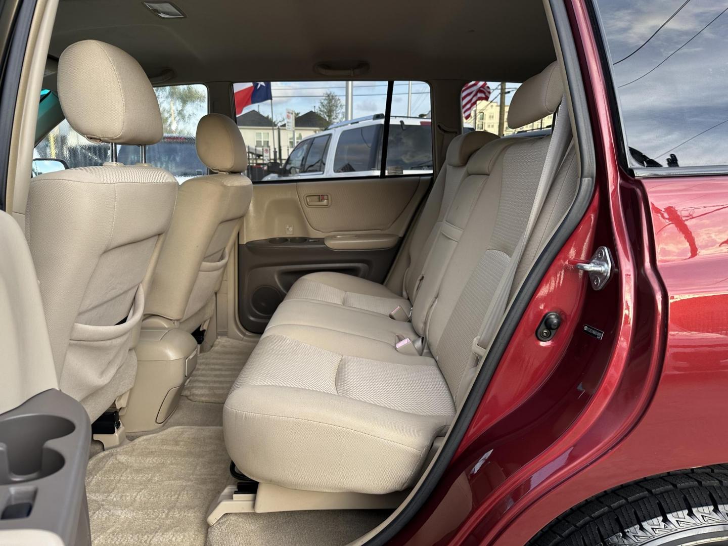 2006 Red /Beige Toyota Highlander 2WD (JTEGD21A060) with an 2.4L L4 DOHC 16V engine, 4-Speed Automatic Overdrive transmission, located at 1501 West 15th St., Houston, 77008, (713) 869-2925, 29.797941, -95.411789 - Photo#7