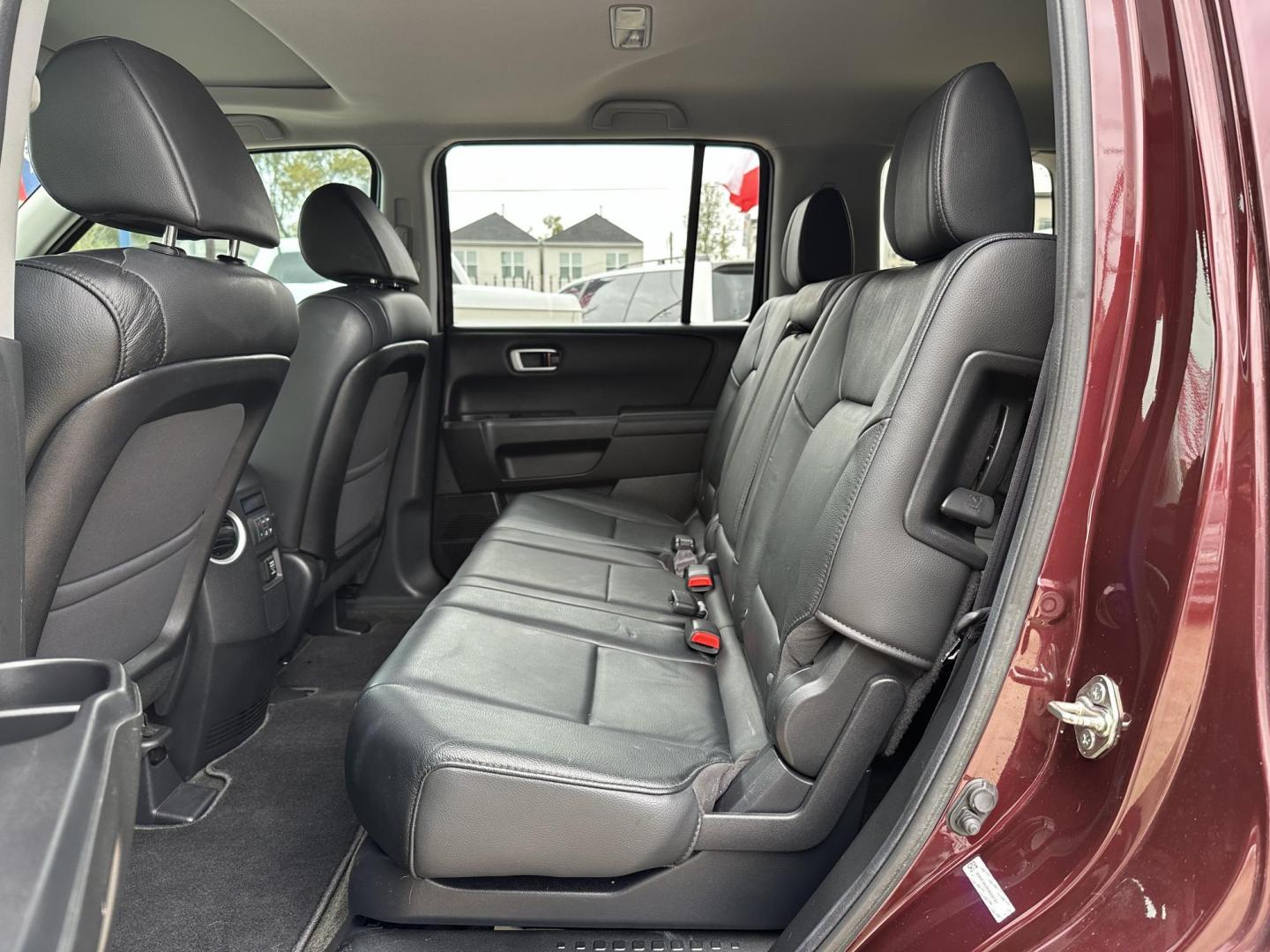 2014 Maroon /Black Honda Pilot EX-L 2WD 5-Spd AT (5FNYF3H58EB) with an 3.5L V6 SOHC 24V engine, 5-Speed Automatic transmission, located at 1501 West 15th St., Houston, 77008, (713) 869-2925, 29.797941, -95.411789 - Photo#10