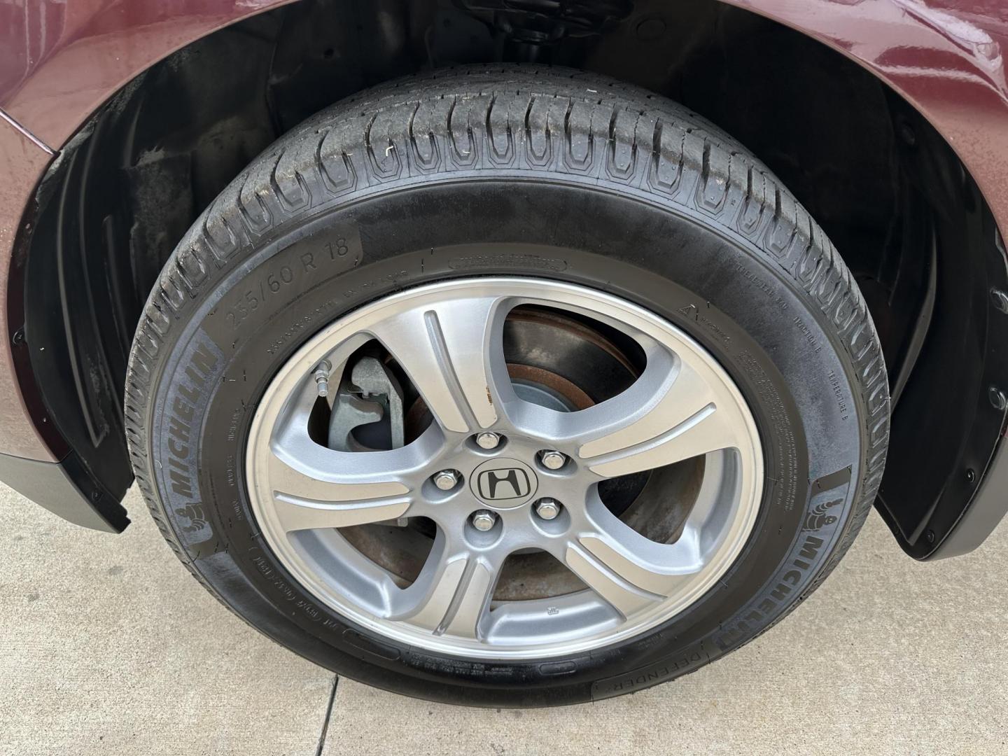 2014 Maroon /Black Honda Pilot EX-L 2WD 5-Spd AT (5FNYF3H58EB) with an 3.5L V6 SOHC 24V engine, 5-Speed Automatic transmission, located at 1501 West 15th St., Houston, 77008, (713) 869-2925, 29.797941, -95.411789 - Photo#11