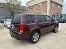 2014 Maroon /Black Honda Pilot EX-L 2WD 5-Spd AT (5FNYF3H58EB) with an 3.5L V6 SOHC 24V engine, 5-Speed Automatic transmission, located at 1501 West 15th St., Houston, 77008, (713) 869-2925, 29.797941, -95.411789 - Photo#2