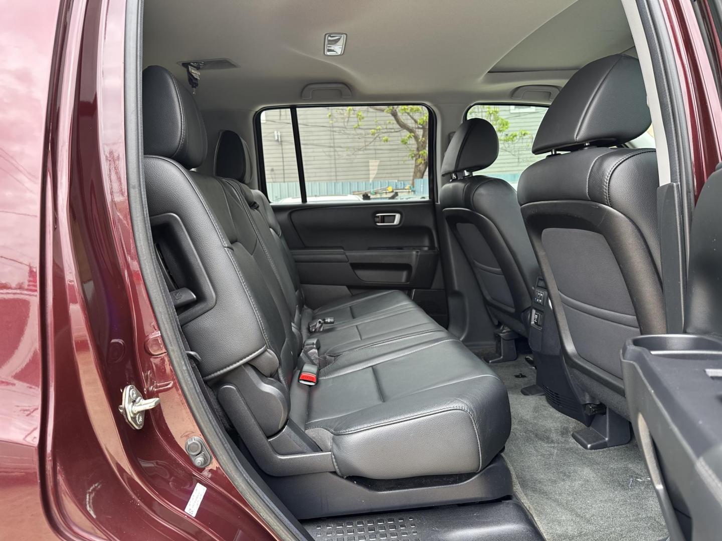 2014 Maroon /Black Honda Pilot EX-L 2WD 5-Spd AT (5FNYF3H58EB) with an 3.5L V6 SOHC 24V engine, 5-Speed Automatic transmission, located at 1501 West 15th St., Houston, 77008, (713) 869-2925, 29.797941, -95.411789 - Photo#5