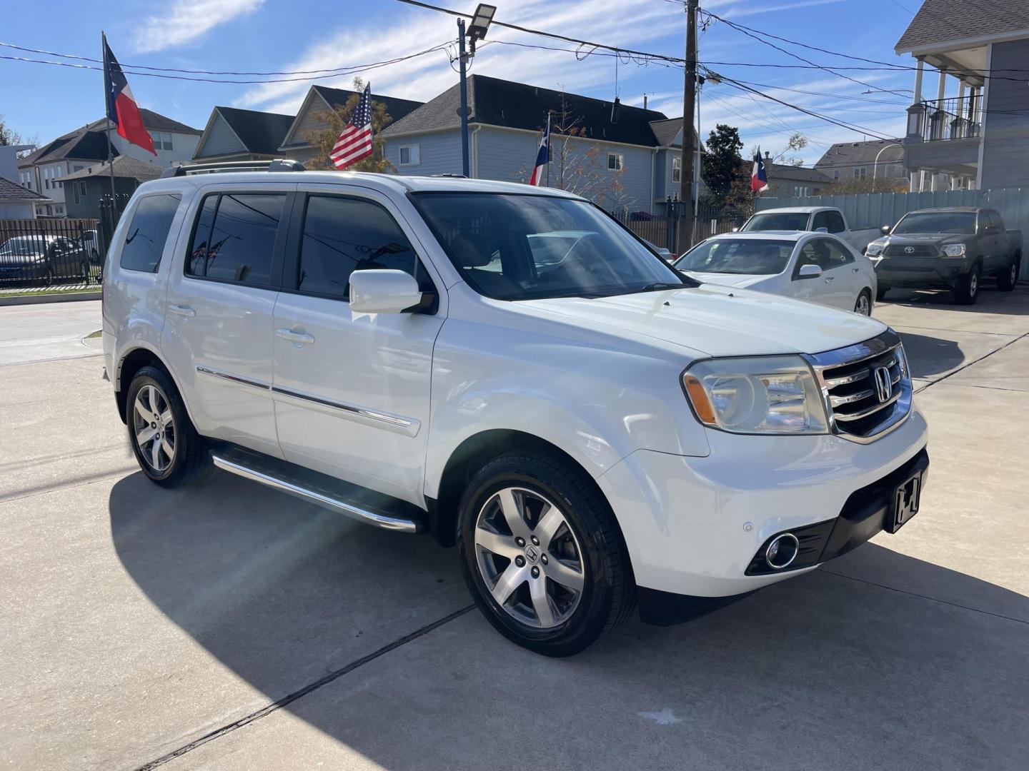 2014 White /Silver Honda Pilot Touring 2WD 5-Spd AT with DVD (5FNYF3H90EB) with an 3.5L V6 SOHC 24V engine, 5-Speed Automatic transmission, located at 1501 West 15th St., Houston, 77008, (713) 869-2925, 29.797941, -95.411789 - Photo#1