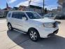 2014 White /Silver Honda Pilot Touring 2WD 5-Spd AT with DVD (5FNYF3H90EB) with an 3.5L V6 SOHC 24V engine, 5-Speed Automatic transmission, located at 1501 West 15th St., Houston, 77008, (713) 869-2925, 29.797941, -95.411789 - Photo#1