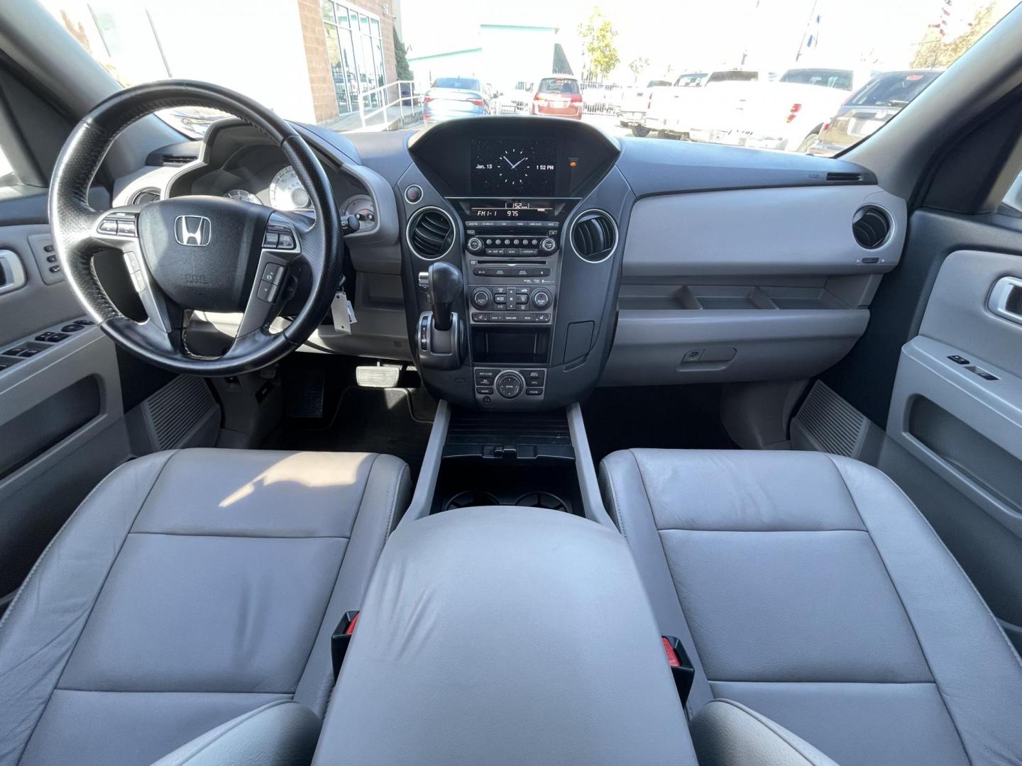 2014 White /Silver Honda Pilot Touring 2WD 5-Spd AT with DVD (5FNYF3H90EB) with an 3.5L V6 SOHC 24V engine, 5-Speed Automatic transmission, located at 1501 West 15th St., Houston, 77008, (713) 869-2925, 29.797941, -95.411789 - Photo#11